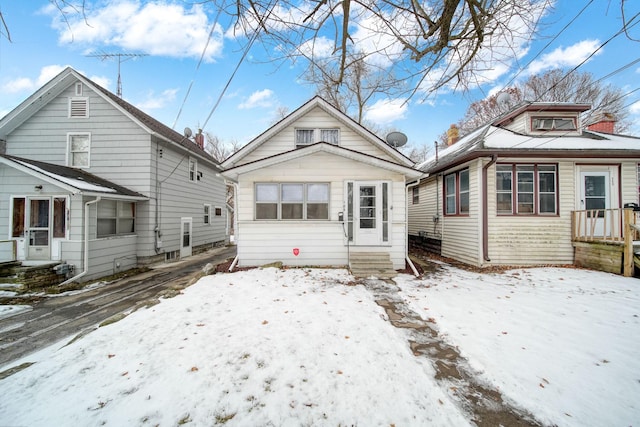 view of snow covered house