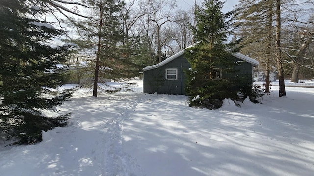 view of snow covered property