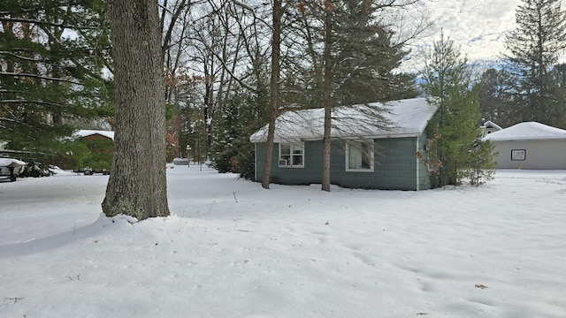 view of snow covered property