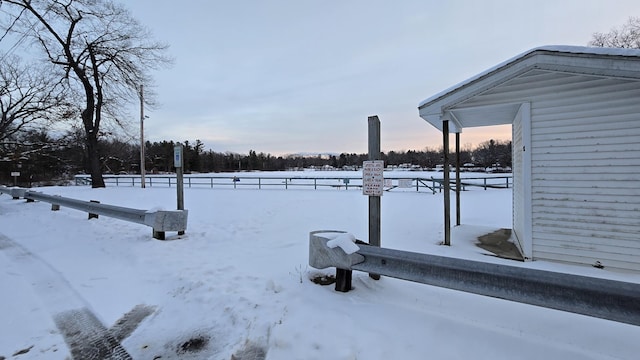 view of yard covered in snow