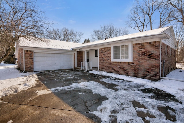 single story home with a garage