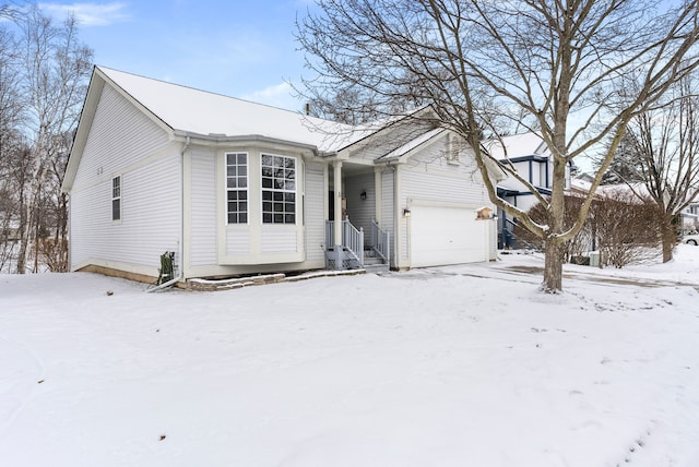 ranch-style home with a garage