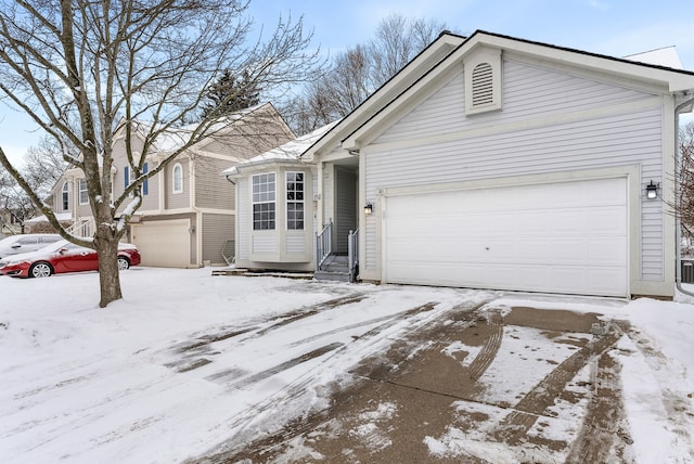 view of front of property featuring a garage