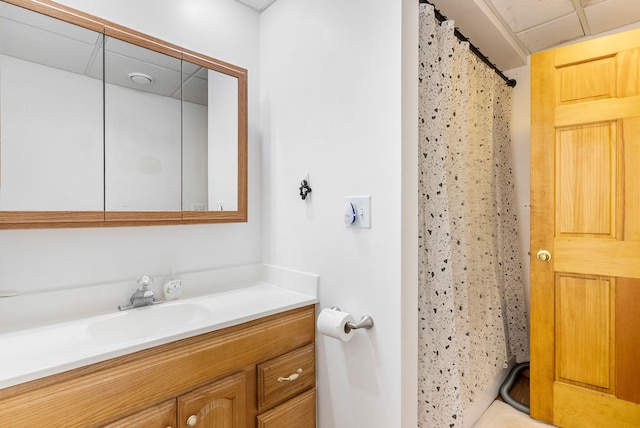 bathroom featuring vanity and a shower with shower curtain