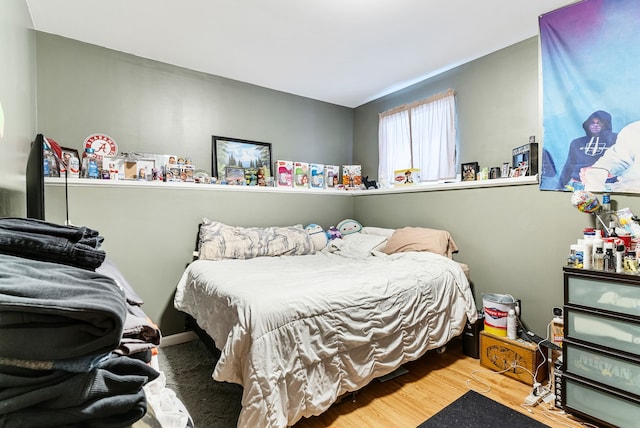 bedroom featuring hardwood / wood-style flooring