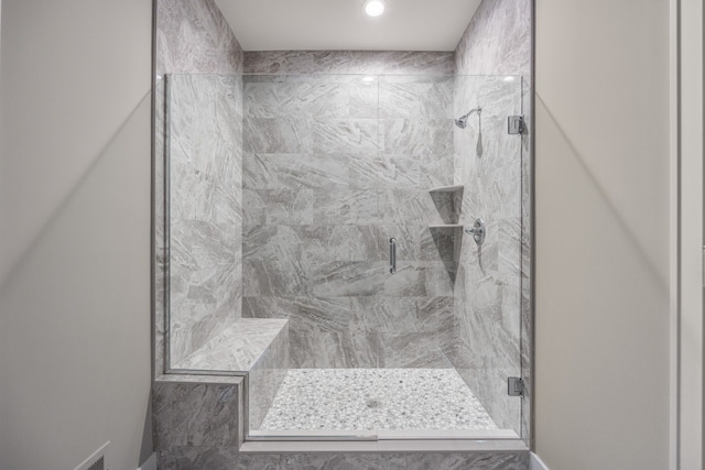 bathroom with an enclosed shower