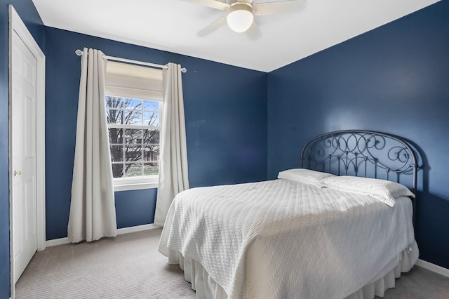 bedroom featuring ceiling fan and carpet flooring