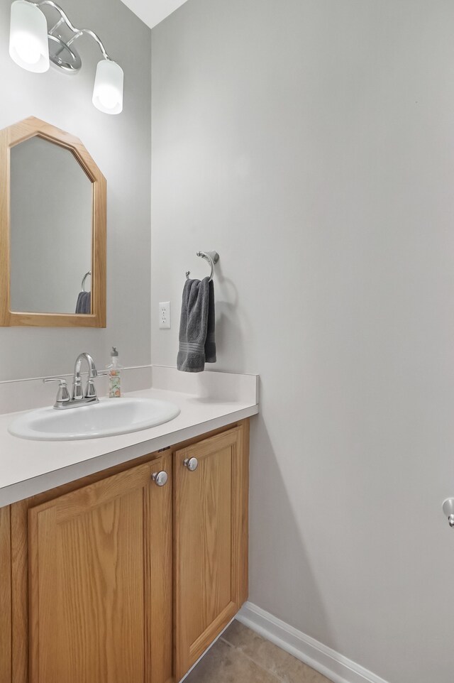 bathroom with vanity and tile patterned flooring