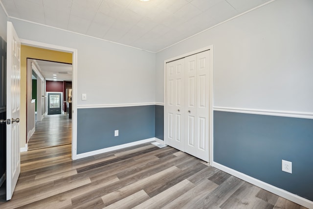 empty room with wood-type flooring