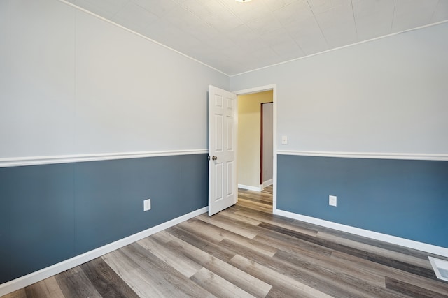 empty room featuring hardwood / wood-style floors