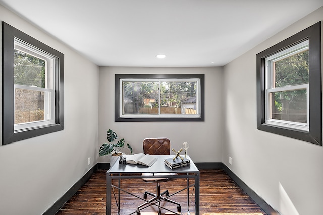 office with dark hardwood / wood-style flooring