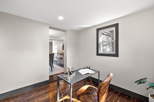 office space with dark hardwood / wood-style floors