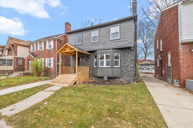 view of front facade featuring a front yard