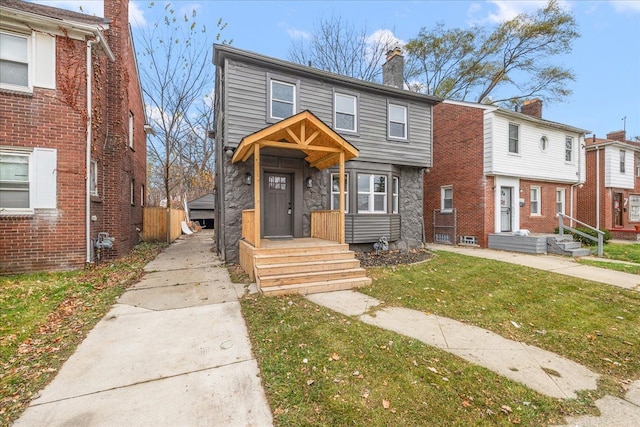 view of front of home with a front lawn