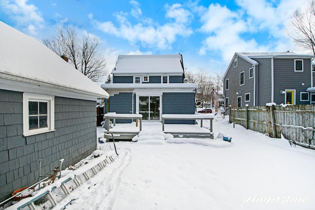 view of snow covered property