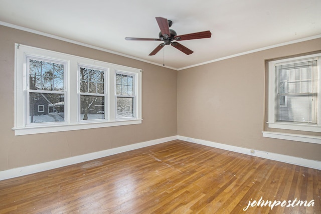 unfurnished room featuring hardwood / wood-style floors, ornamental molding, and ceiling fan