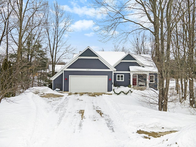 view of front of property with a garage