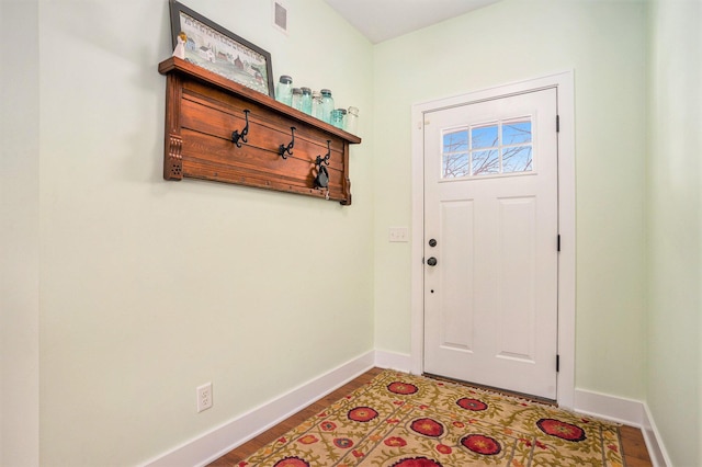 entrance foyer featuring hardwood / wood-style floors