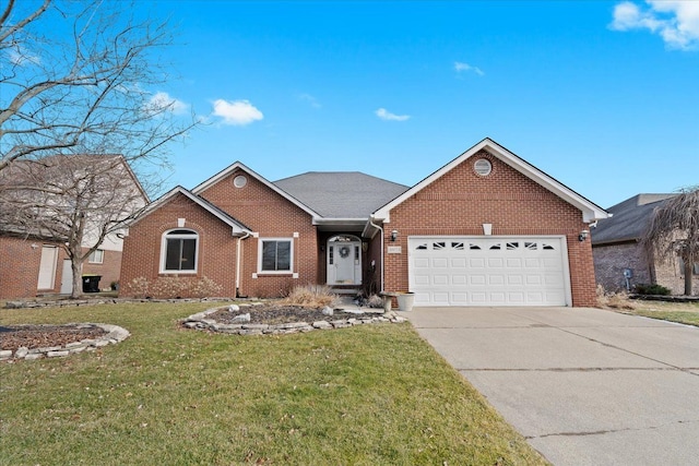 view of front facade with a garage and a front lawn