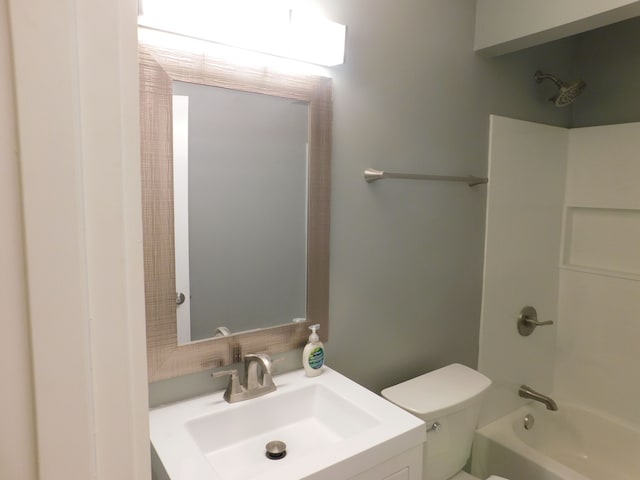 full bathroom with shower / washtub combination, toilet, and vanity