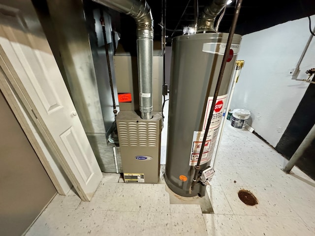 utility room with gas water heater