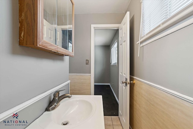 bathroom with sink and tile patterned floors