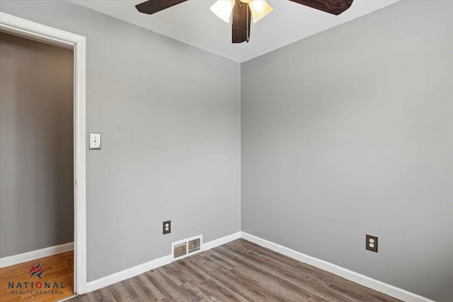 unfurnished room with ceiling fan and wood-type flooring