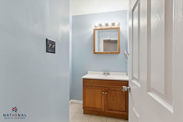 bathroom featuring vanity and tile patterned flooring