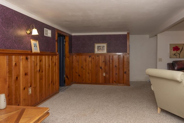 interior space featuring light carpet and wooden walls