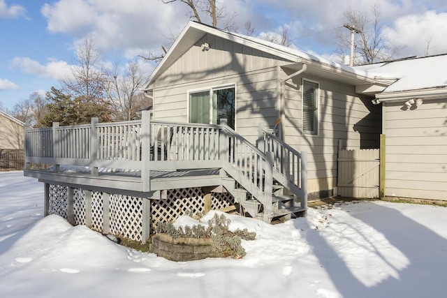 view of snow covered deck