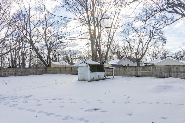 view of yard layered in snow