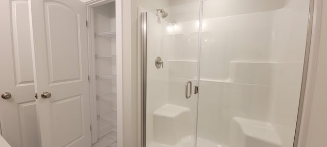 bathroom with walk in shower