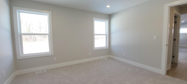 view of carpeted spare room