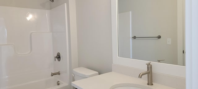 full bathroom with shower / washtub combination, toilet, and vanity