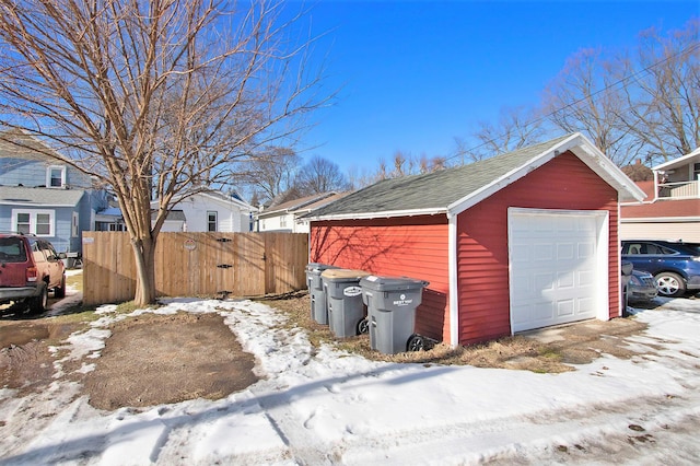 view of snow covered garage