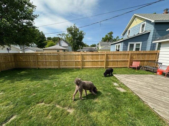 view of yard with a wooden deck