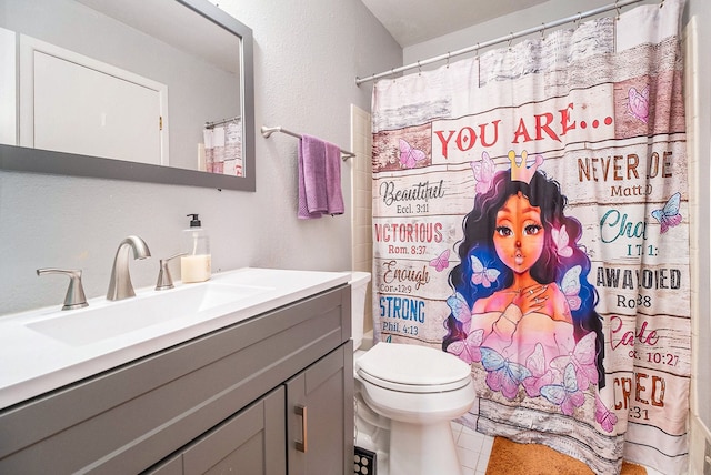 bathroom featuring vanity, walk in shower, tile patterned floors, and toilet