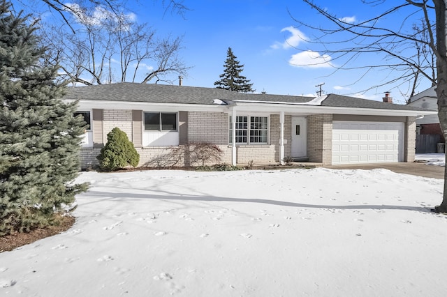 single story home featuring a garage