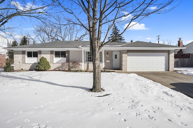 single story home featuring a garage