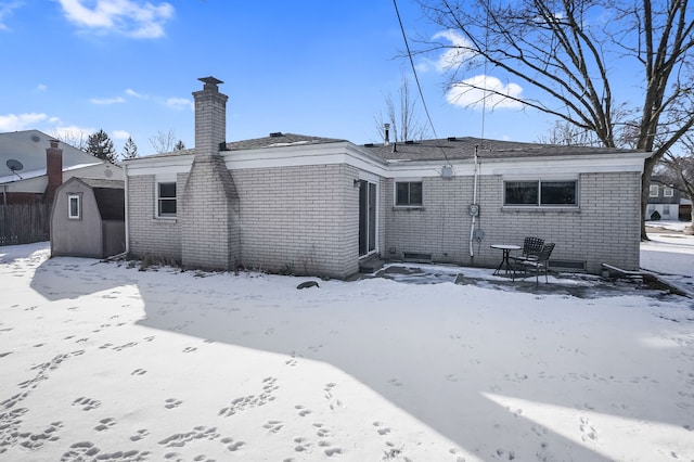 view of snow covered property