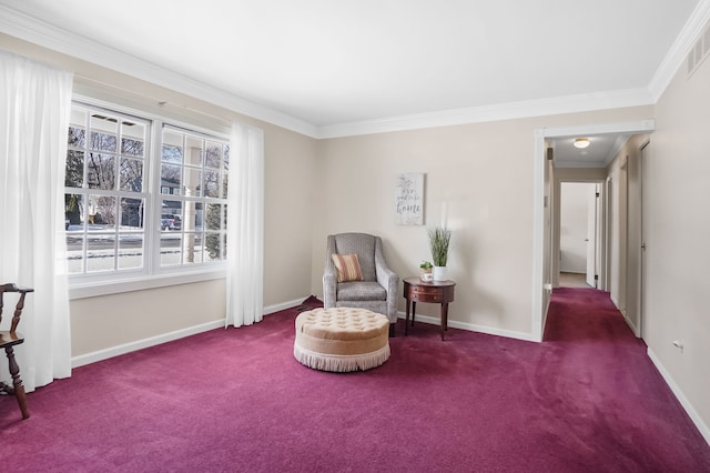 sitting room featuring ornamental molding and dark carpet