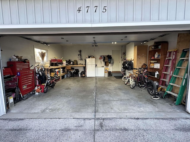 garage with white fridge