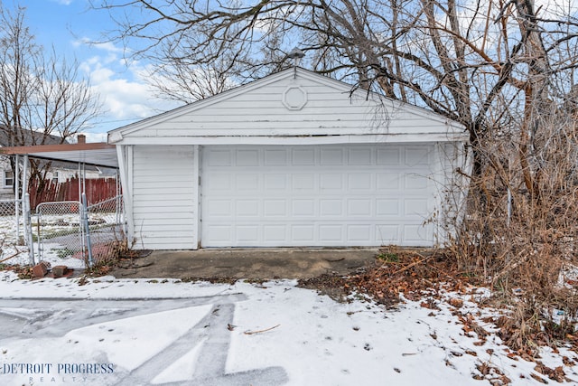 view of snow covered garage