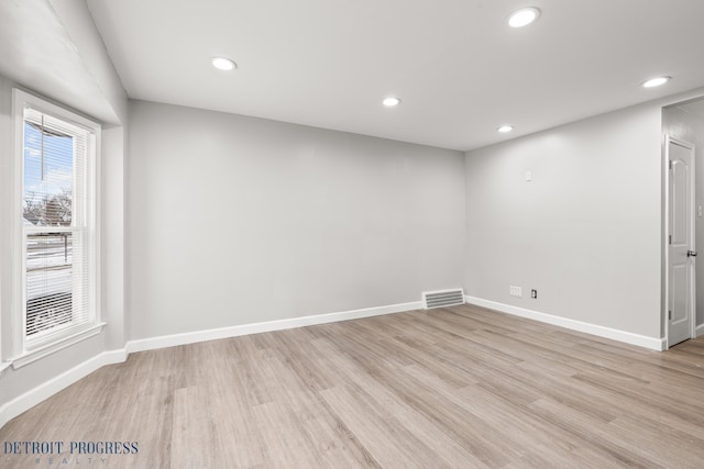 unfurnished room featuring light wood-type flooring