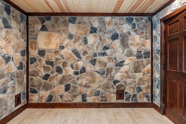 interior details featuring wood-type flooring and wooden ceiling