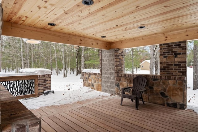 view of snow covered deck