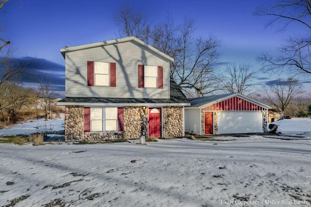 view of front of property with a garage