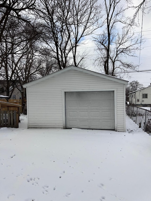 view of snow covered garage