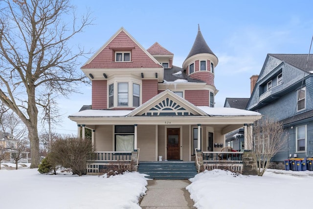 victorian-style house with covered porch