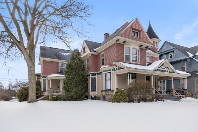 victorian-style house with a porch